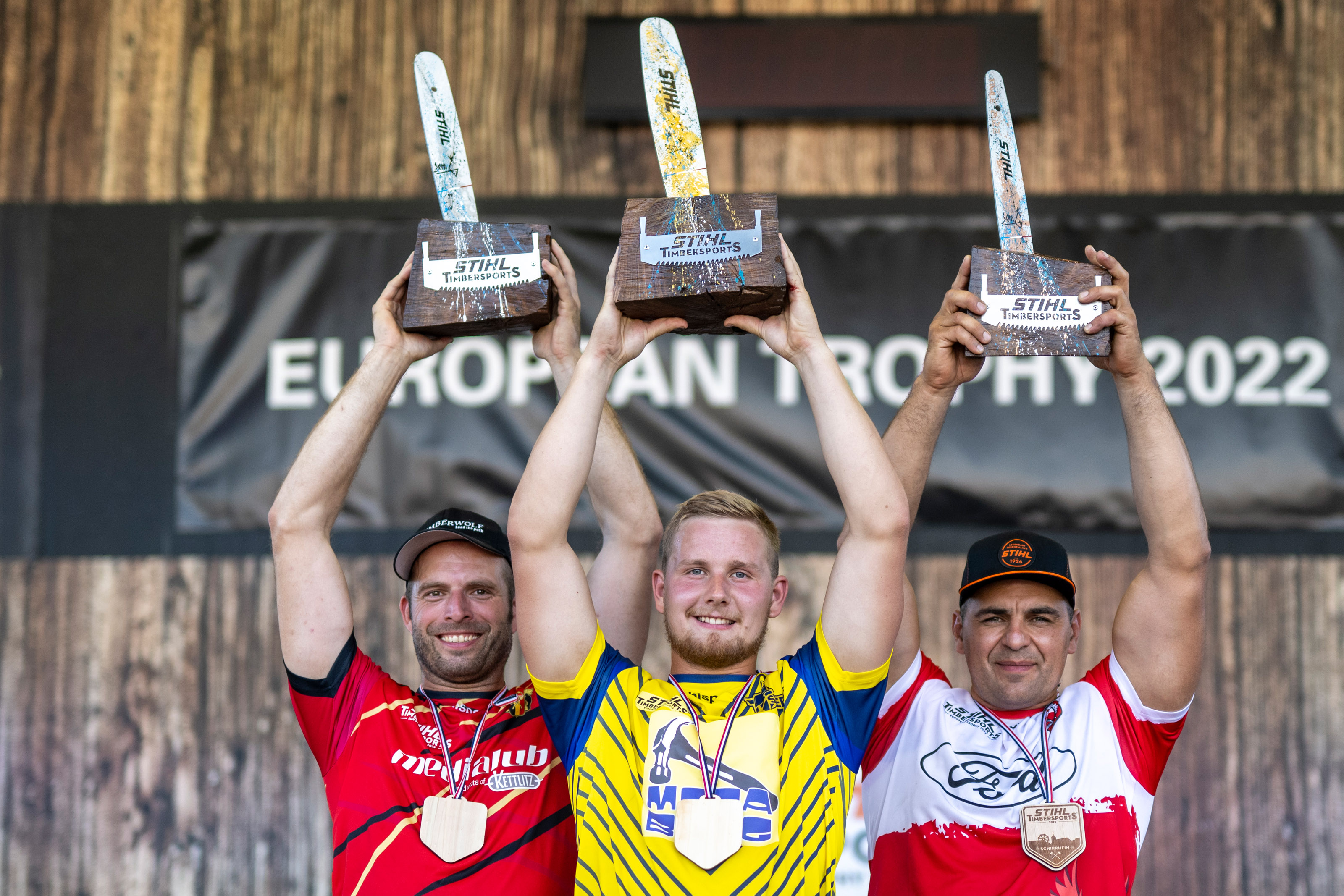 Hansson, Martens and Dubicki celebrate their podium finishes at the 2022 European Trophy.