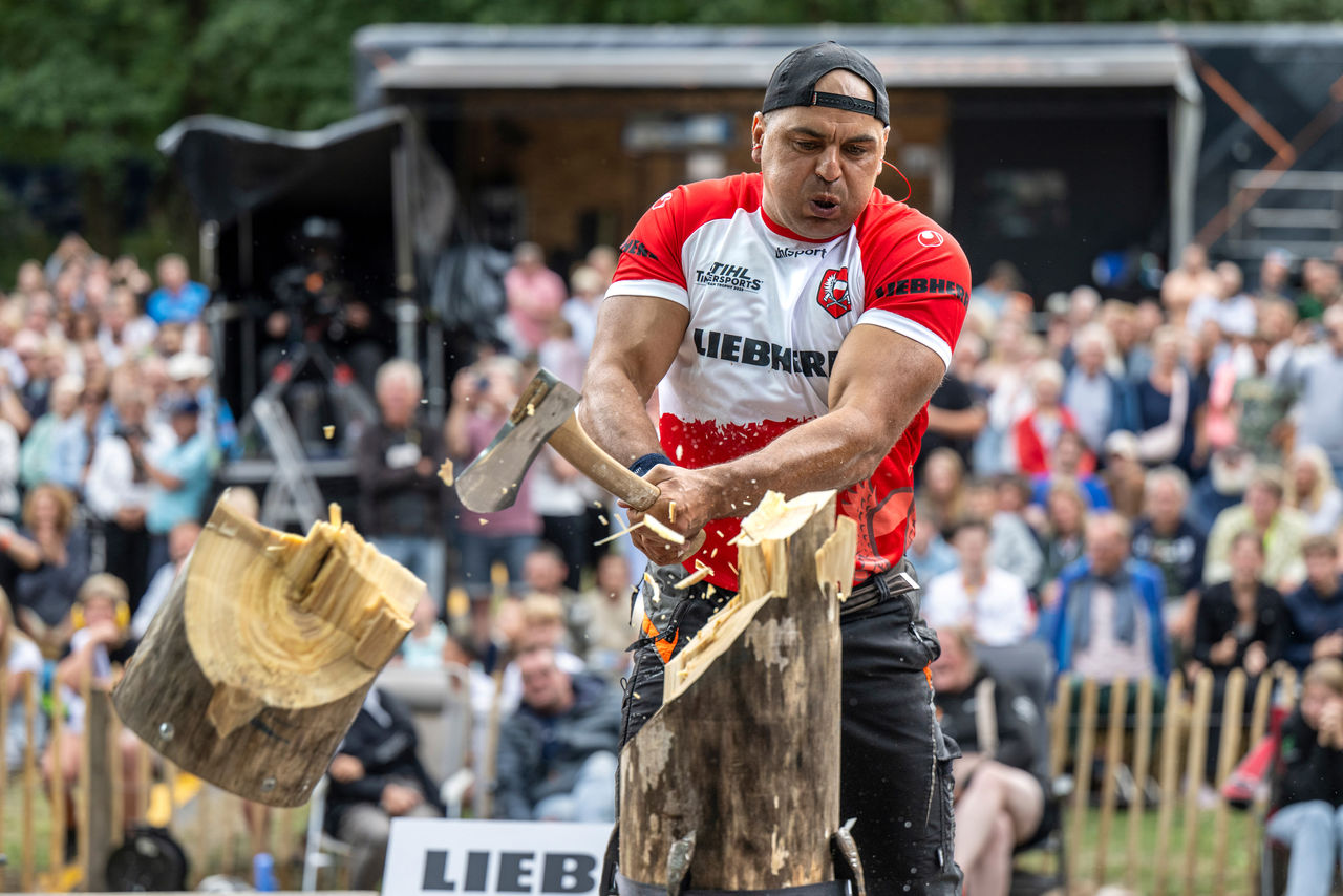 Polish athlete Michal Dubicki performing the Standing Block Chop.